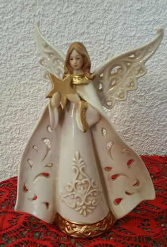 Engel mit Stern aus Keramik